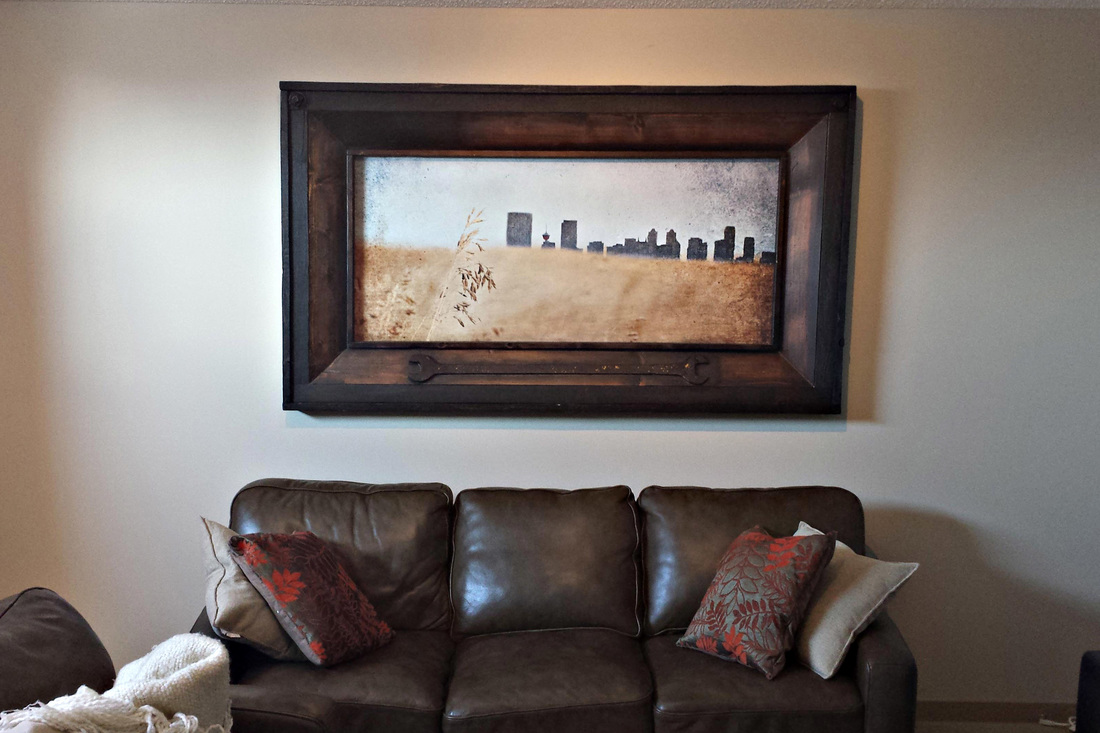 Original painting of Calgary Cityscape.  Brad is a Calgary artist and showcases his wort in Alberta art galleries mainly in Calgary and Edmonton.  Calgary and Edmonton Designers love his work and this piece is hung in a beautiful rustic Calgary Home.